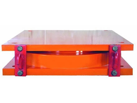 An orange color pot bearing with thick top steel plate and bottom steel plate.